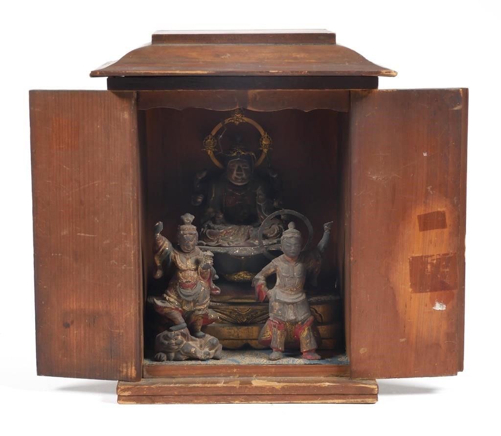 Appraisal: Hindu travel shrine Three hand carved and painted wood deities