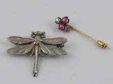 Appraisal: A Russian carat gold stick pin diamonds and rubies forming