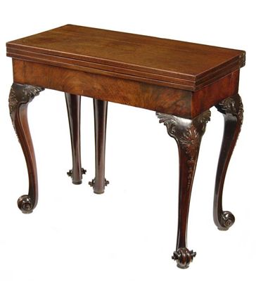 Appraisal: A George II mahogany games and tea table the rectangular