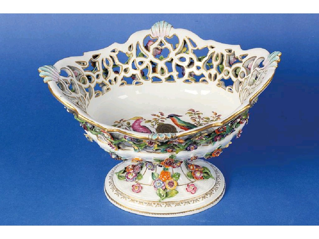 Appraisal: A DRESDEN FLORAL ENCRUSTED PEDESTAL BASKET the quatrefoil shaped pierced