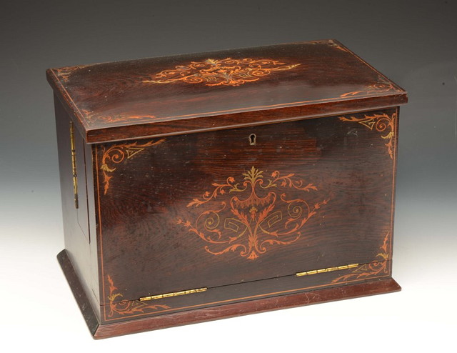 Appraisal: AN EDWARDIAN ROSEWOOD WRITING BOX the fall front with fitted