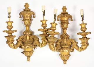 Appraisal: Pair of Continental giltwood carved wall sconces each having an