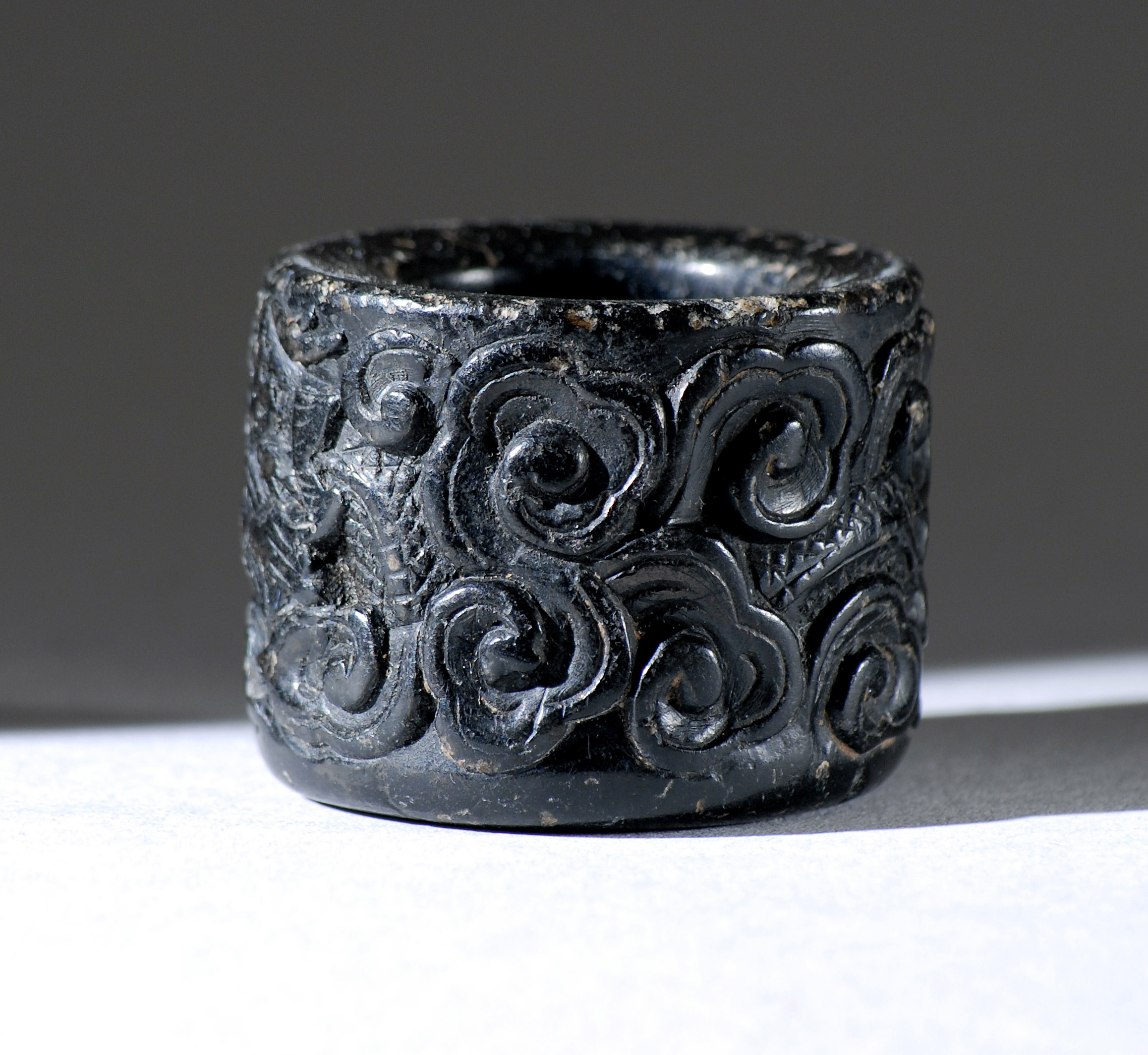 Appraisal: BLACK JADE SCHOLAR'S RING th CenturyWith dramatic dragon and cloud