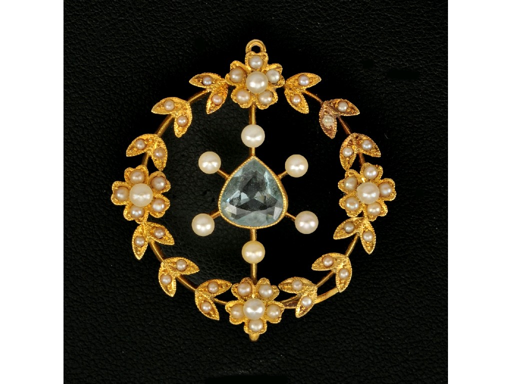 Appraisal: An Aquamarine and Seed Pearl Pendant Brooch the central pear-cut