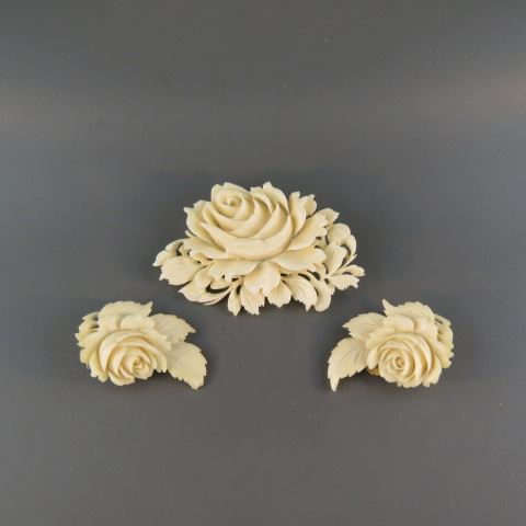 Appraisal: Carved Ivory Pin and Earrings deeply carved roses clip style