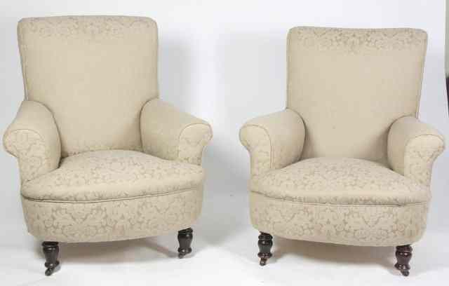 Appraisal: A pair of Victorian upholstered armchairs on turned legs