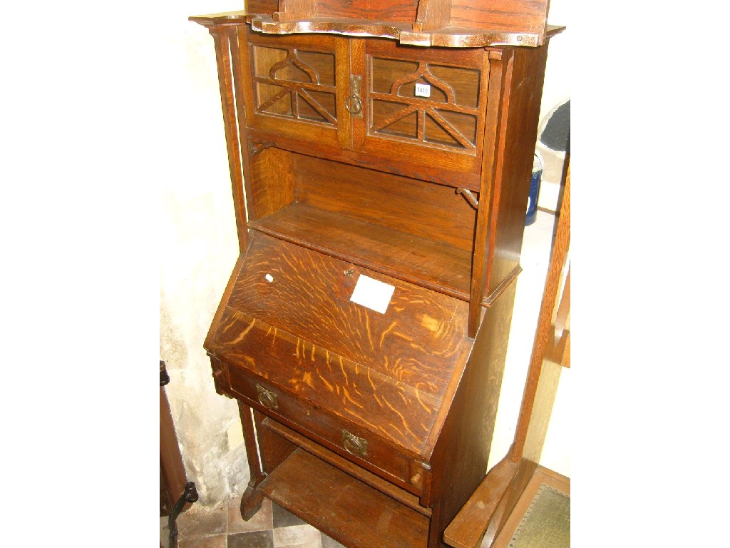 Appraisal: An Arts Crafts style oak bureau bookcase the upper section