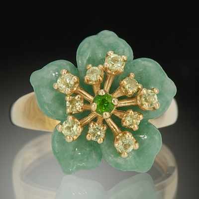 Appraisal: A Carved Jade Flower Ring Carved green jadeite flower W