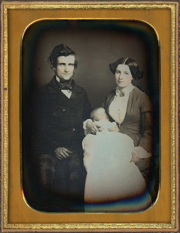 Appraisal: A COUPLE THEIR BABY HALF PLATE DAGUERREOTYPE Half plate daguerreotype