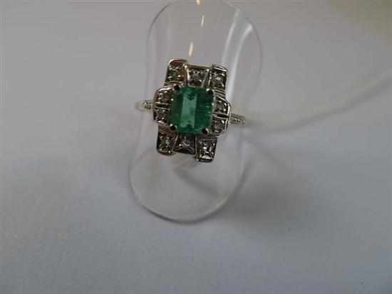 Appraisal: AN EMERALD AND DIAMOND DRESS RING STAMPED CT GOLD