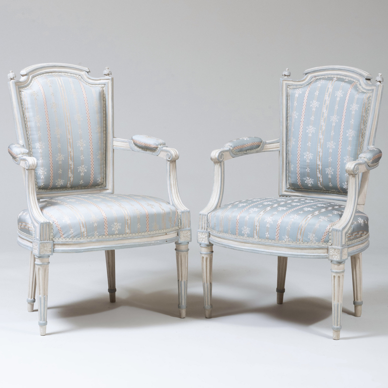 Appraisal: PAIR OF LOUIS XVI CREAM AND BLUE PAINTED FAUTEUILS EN