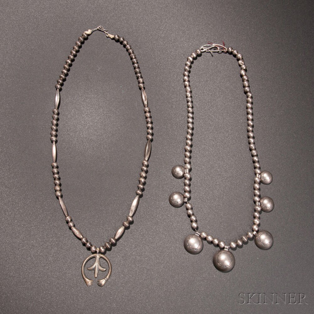 Appraisal: Two Navajo Silver Necklaces the first with diminutive naja the