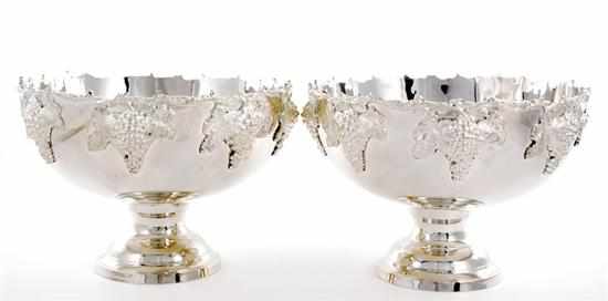 Appraisal: Pair silverplate pedestal punchbowls scalloped rim on deep bowl decorated