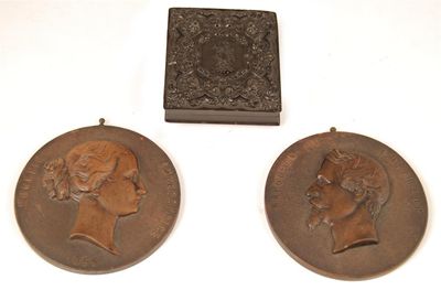 Appraisal: A pair of th century bois durci circular portrait plaques