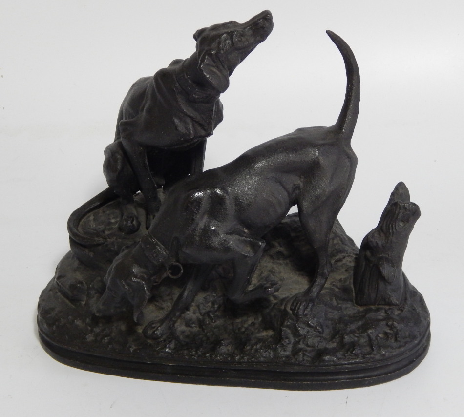 Appraisal: A thC spelter group of two pointers on a oval