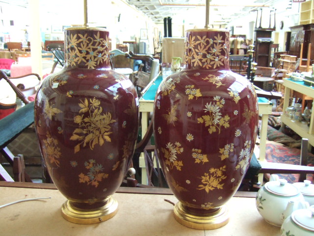 Appraisal: A pair of European earthenware table lamps second half th