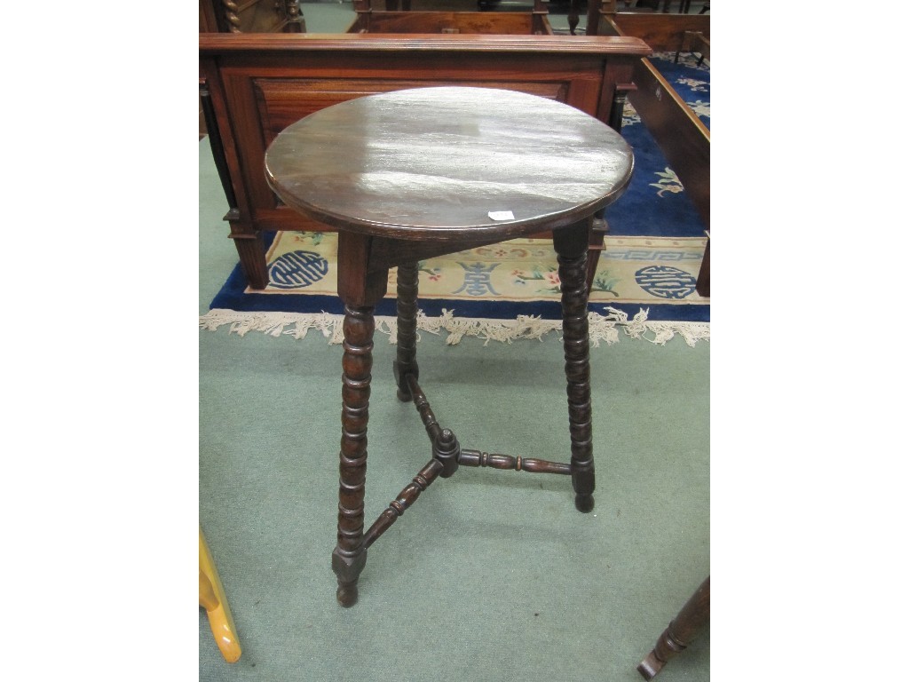 Appraisal: th Century style circular occasional table on bobbin twist supports