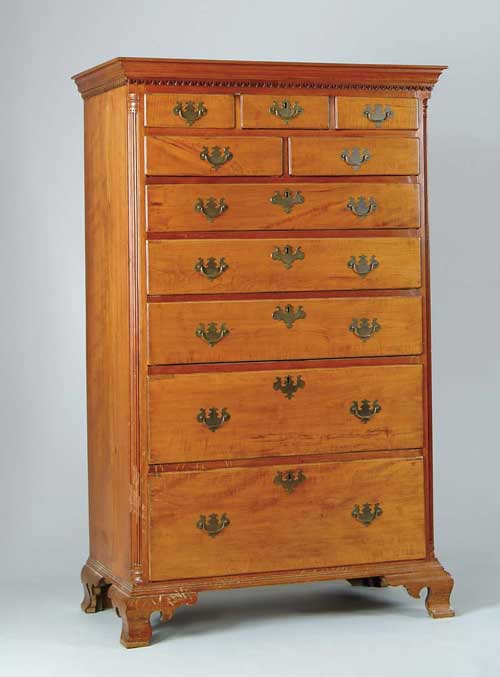 Appraisal: TEN DRAWER GRADUATED CHERRY MAPLE TALL CHEST Curly maple drawer