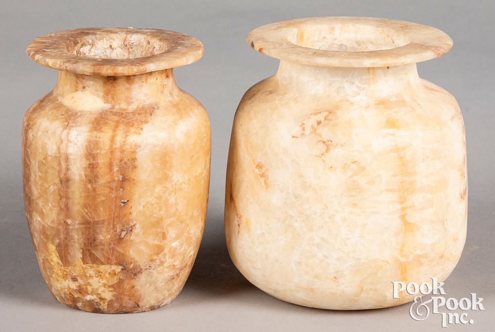 Appraisal: Two Egyptian alabaster vases Two Egyptian alabaster vases h and