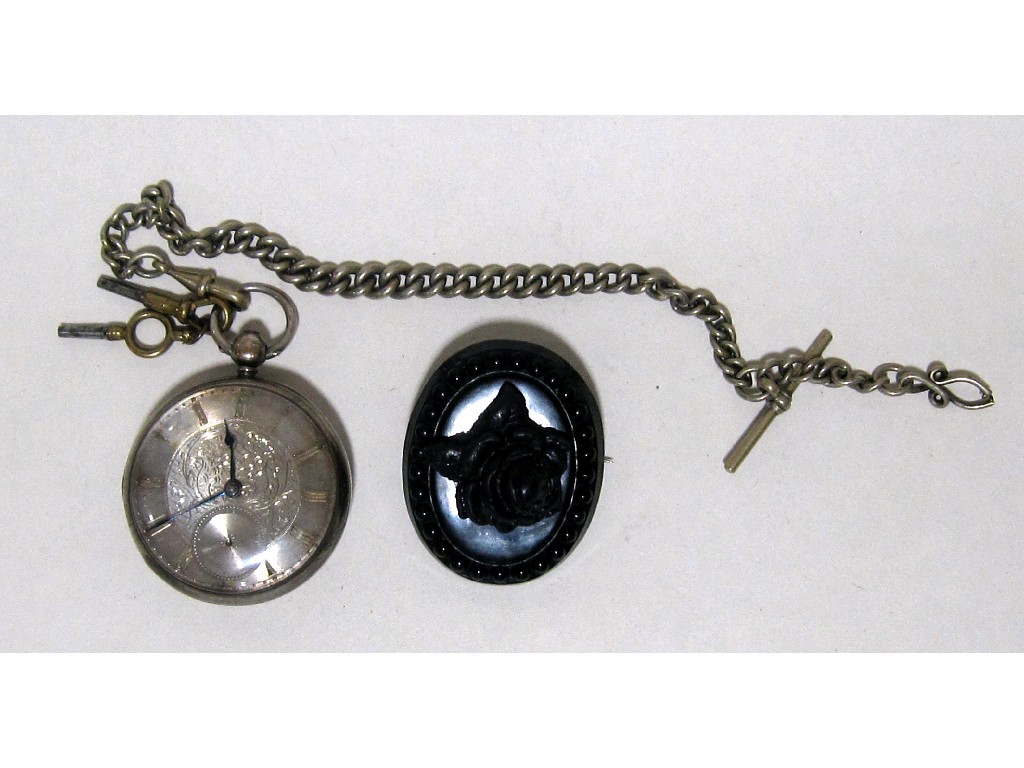 Appraisal: Lot comprising silver pocket watch and an oval jet brooch