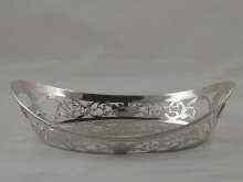 Appraisal: A silver pierced oval bread basket with gadrooned rim maker's