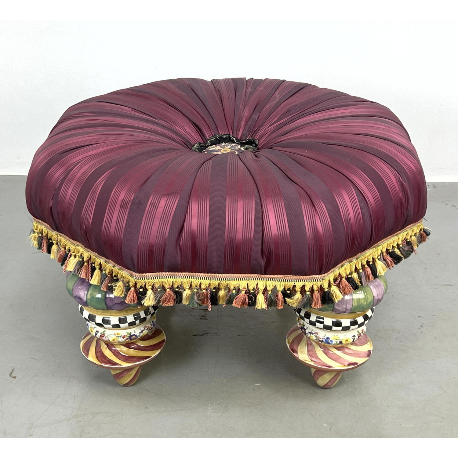 Appraisal: MacKENZIE CHILDS Upholstered Cushion Ottoman Large Hand Painted Glazed Pottery