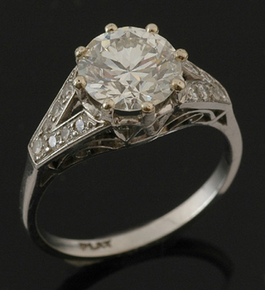 Appraisal: A solitaire diamond ring The round briliant cut diamond weighng