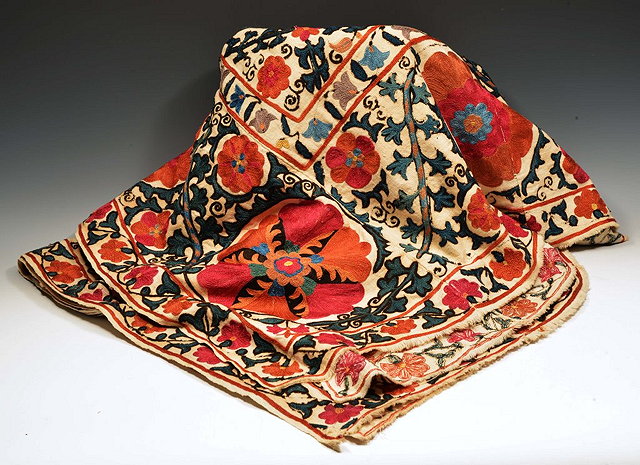 Appraisal: A CENTRAL ASIAN SUZANI with pomegranate designs approximately cm x