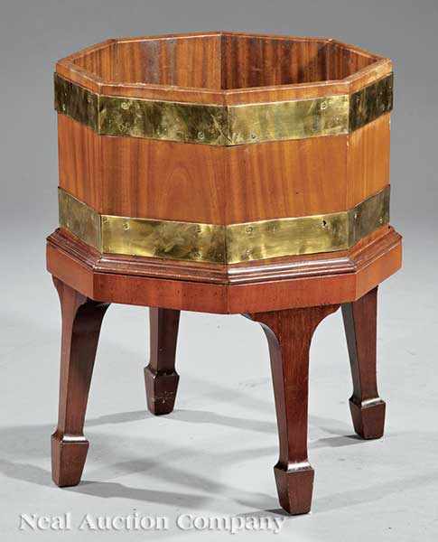 Appraisal: A Georgian-Style Mahogany Brass-Bound Wine Cooler th c octagonal conforming