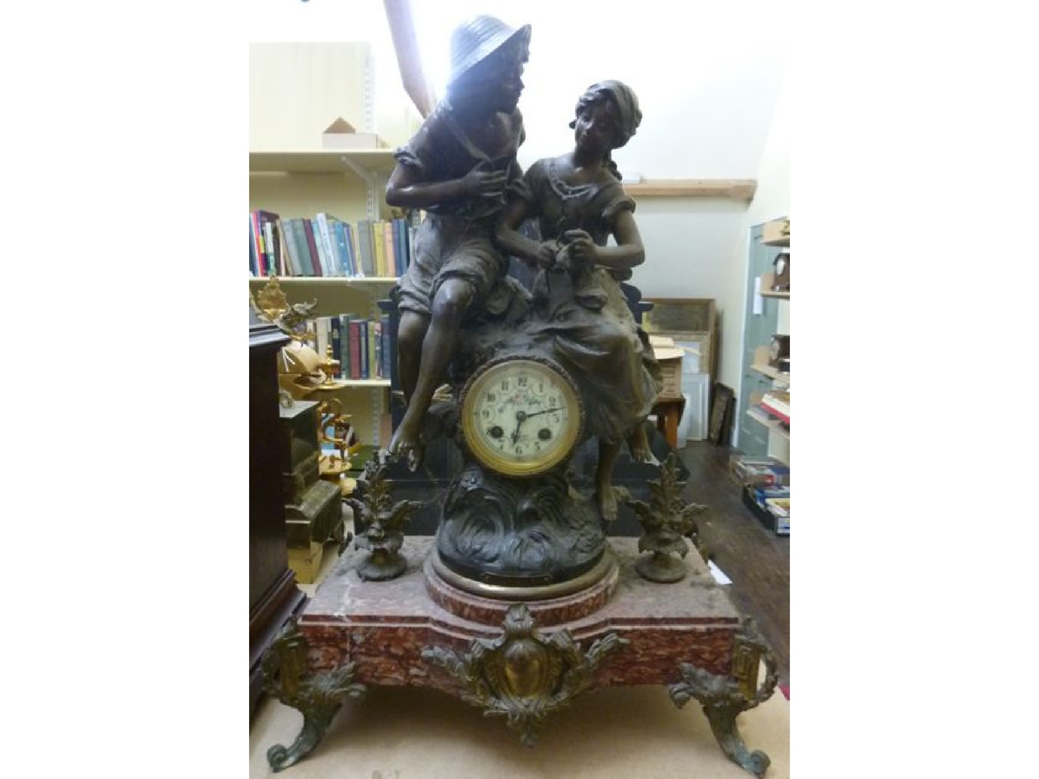 Appraisal: A th century continental mantle clock in spelter the small