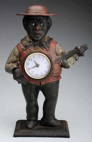 Appraisal: Cast iron Banjo Player Moving Eye Clock Later casting Replaced