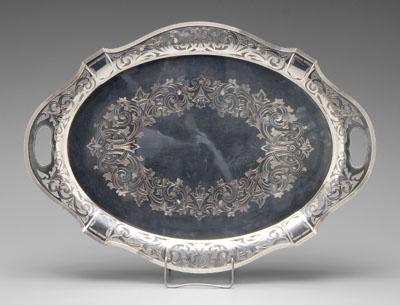 Appraisal: Silver plated tray cartouche shape scroll and floral openwork border