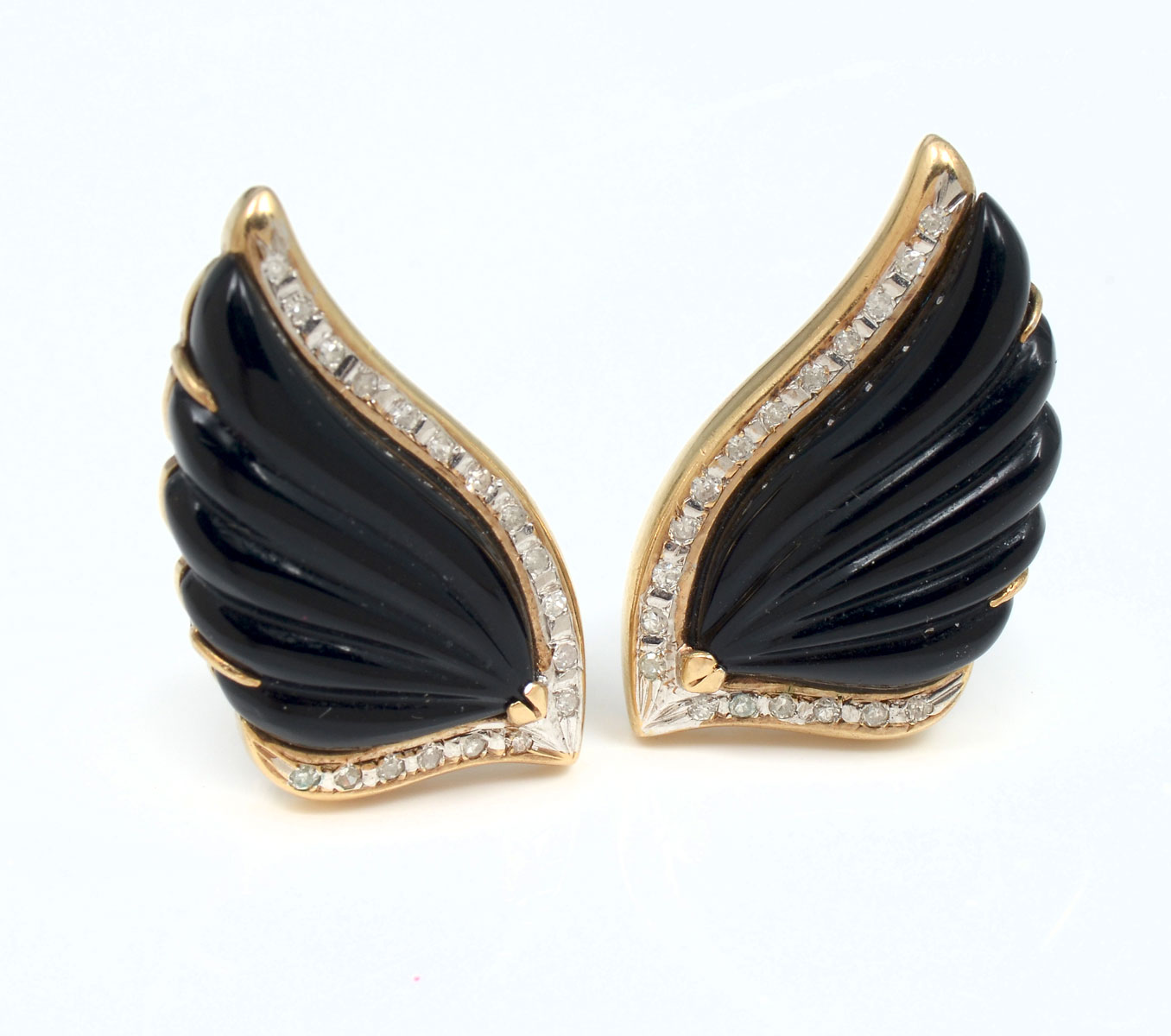 Appraisal: K ONYX DIAMOND EARRINGS K yellow gold earrings contain round