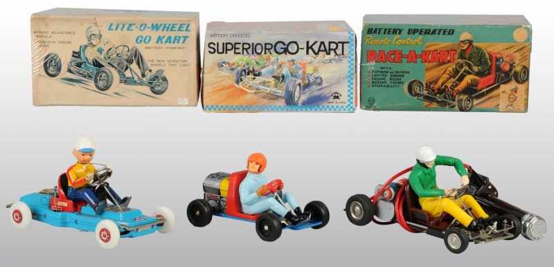 Appraisal: Lot of Tin Go-Kart Battery-Operated Toys Description Japanese Working Vinyl