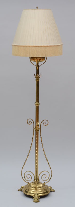 Appraisal: Messenger's Patent Brass Tripod Floor Lamp The pole stem with