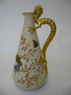 Appraisal: A ROYAL WORCESTER IVORY GROUND EWER late th century of