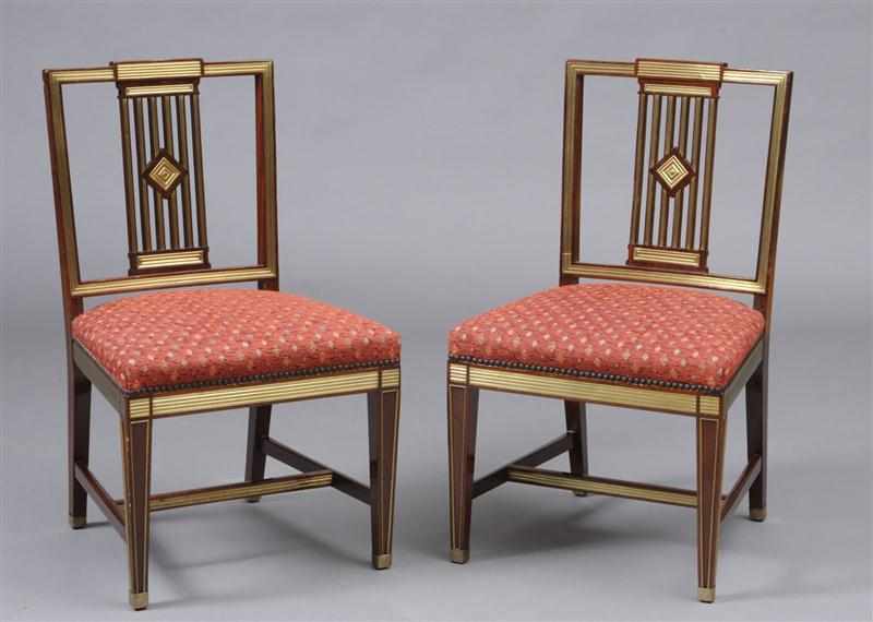 Appraisal: PAIR OF RUSSIAN NEOCLASSICAL BRASS-MOUNTED MAHOGANY SIDE CHAIRS Each with