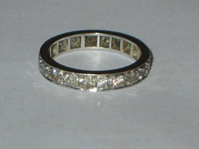 Appraisal: A DIAMOND FULL ETERNITY RING the brilliant cut diamonds set