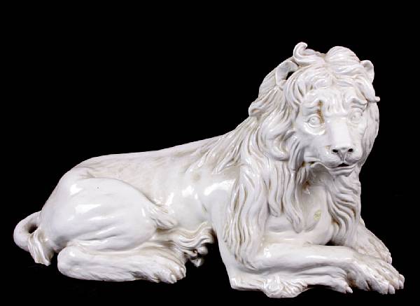 Appraisal: A glazed porcelain figure of a lion height in width