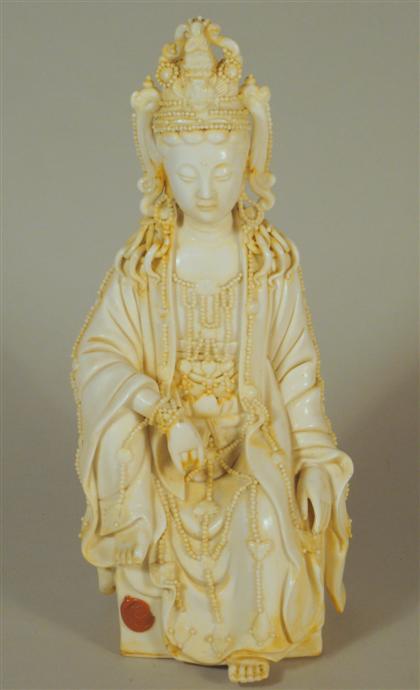 Appraisal: Chinese blanc de chine Quanyin Seated figure serene expression beaded