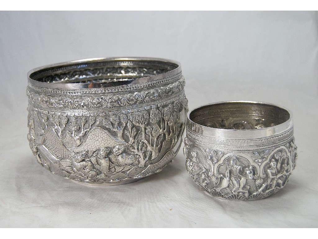 Appraisal: Indian large circular heavily hand-chased bowl depicting figures and trees