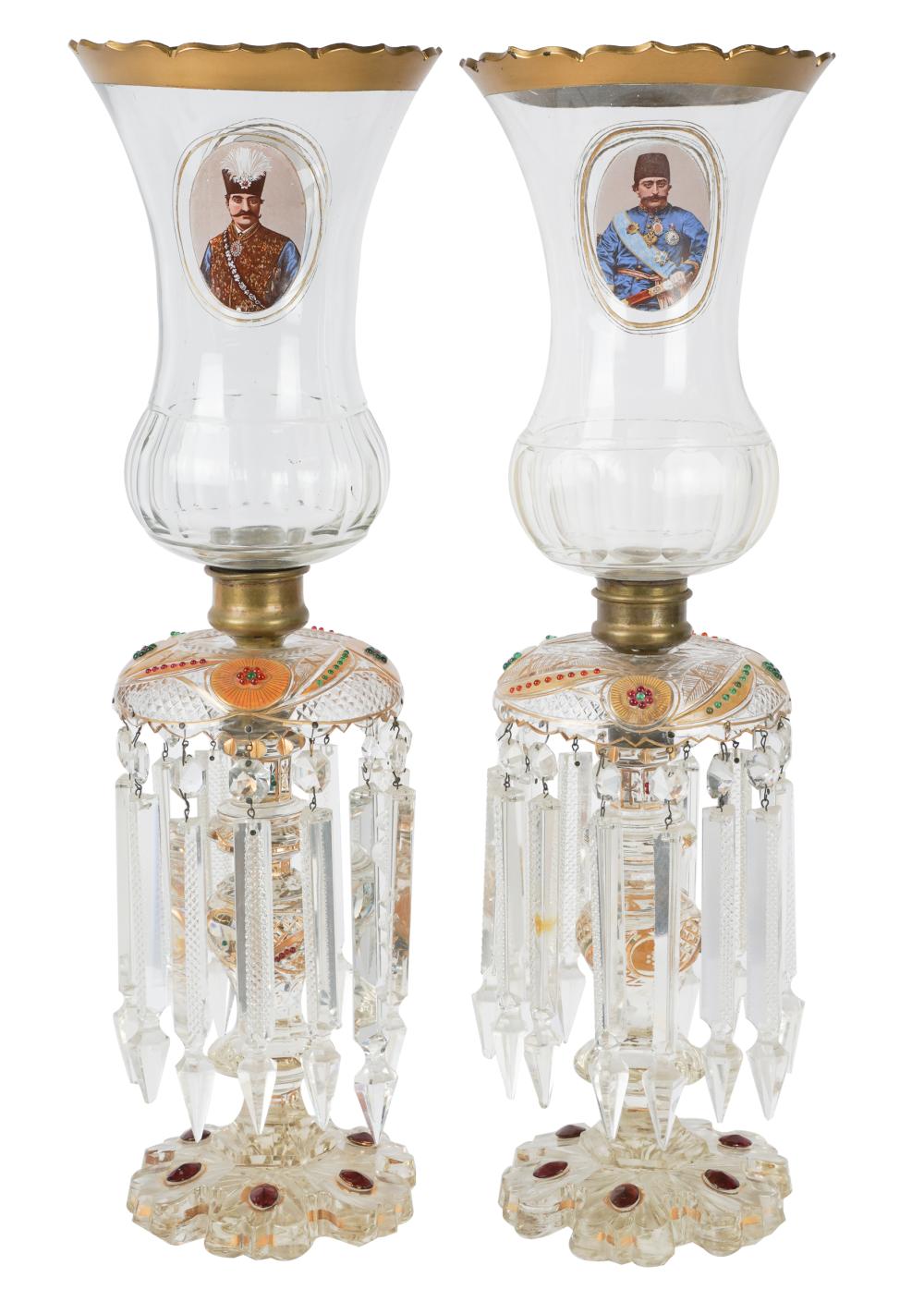 Appraisal: PAIR OF BOHEMIAN ENAMELED GLASS CANDLESTICKSwith hurricanes for the Persian