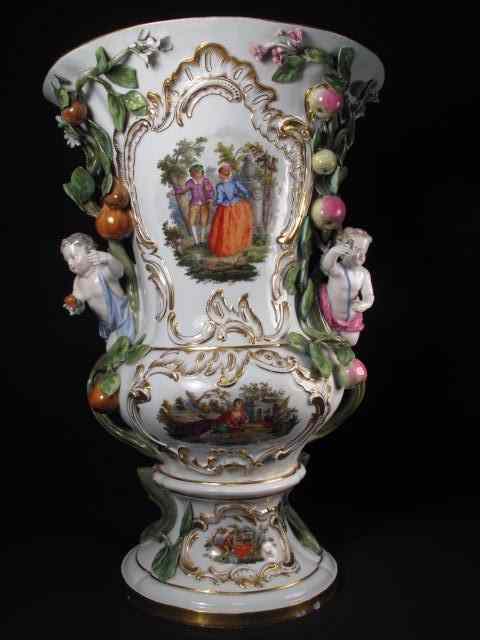 Appraisal: Meissen porcelain urn with cupids Very intricate design depicting cupids