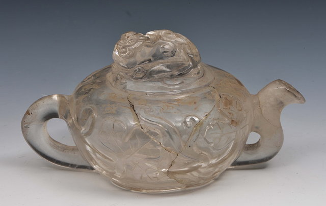 Appraisal: A Chinese rock crystal teapot th Centurythe finial carved with