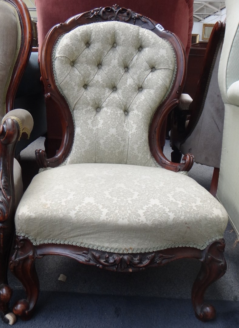 Appraisal: A Victorian mahogany framed button back nursing chair with serpentine