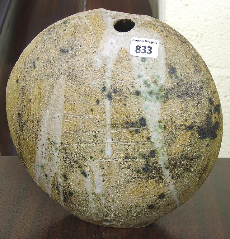 Appraisal: Studio stoneware moon vase decorated with running glaze indistinct seal