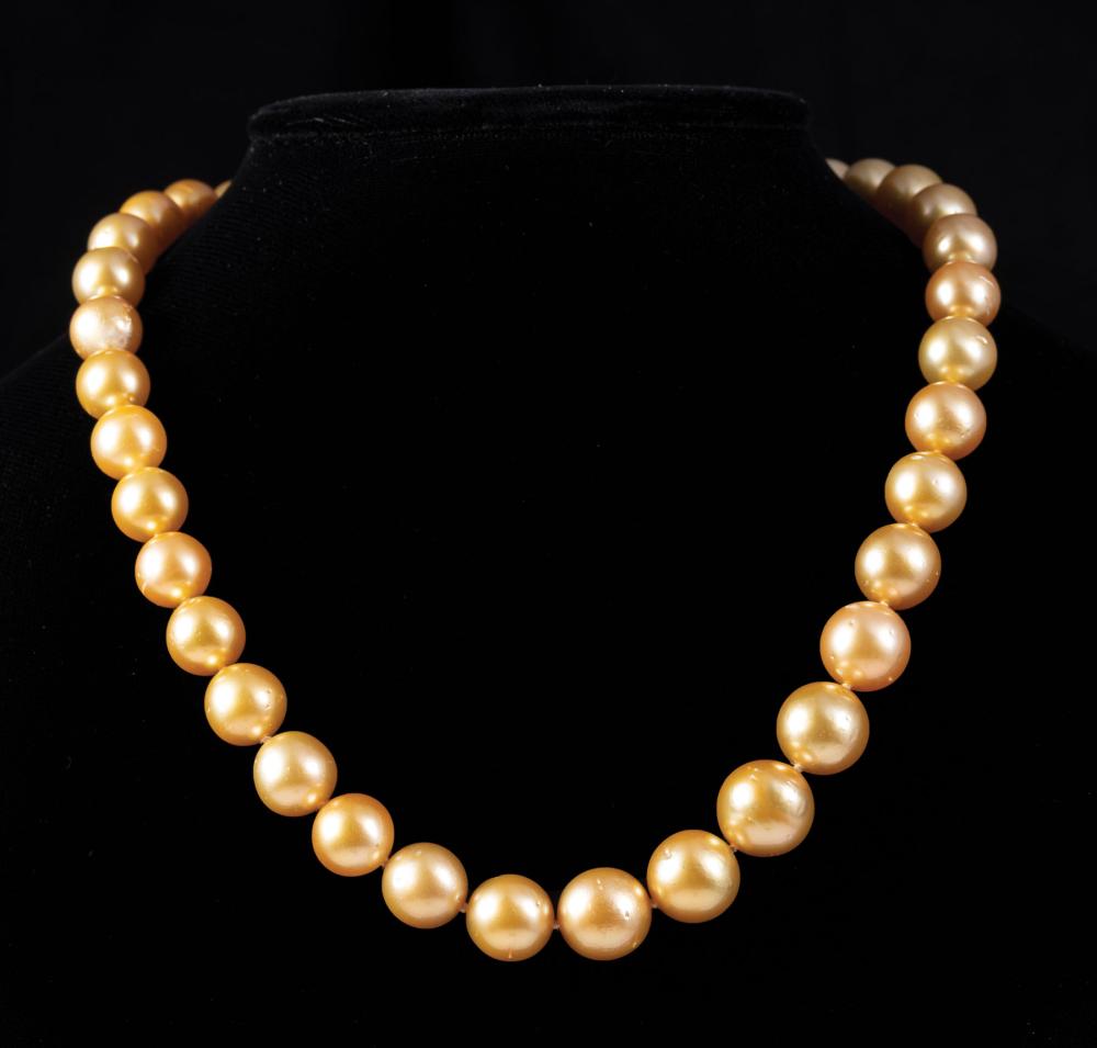 Appraisal: South Sea Pearl Necklace round graduated cultured Golden pearls -