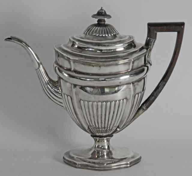 Appraisal: A George III silver hot water jug Duncan Urquhart Naphtali