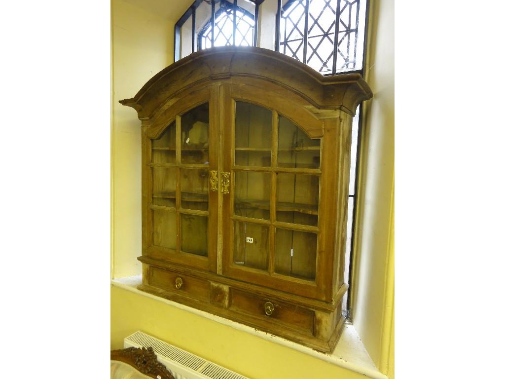 Appraisal: A th century stripped pine wall mounted display cabinet with