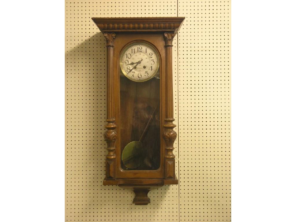 Appraisal: A th century walnut wall clock with silvered dial and